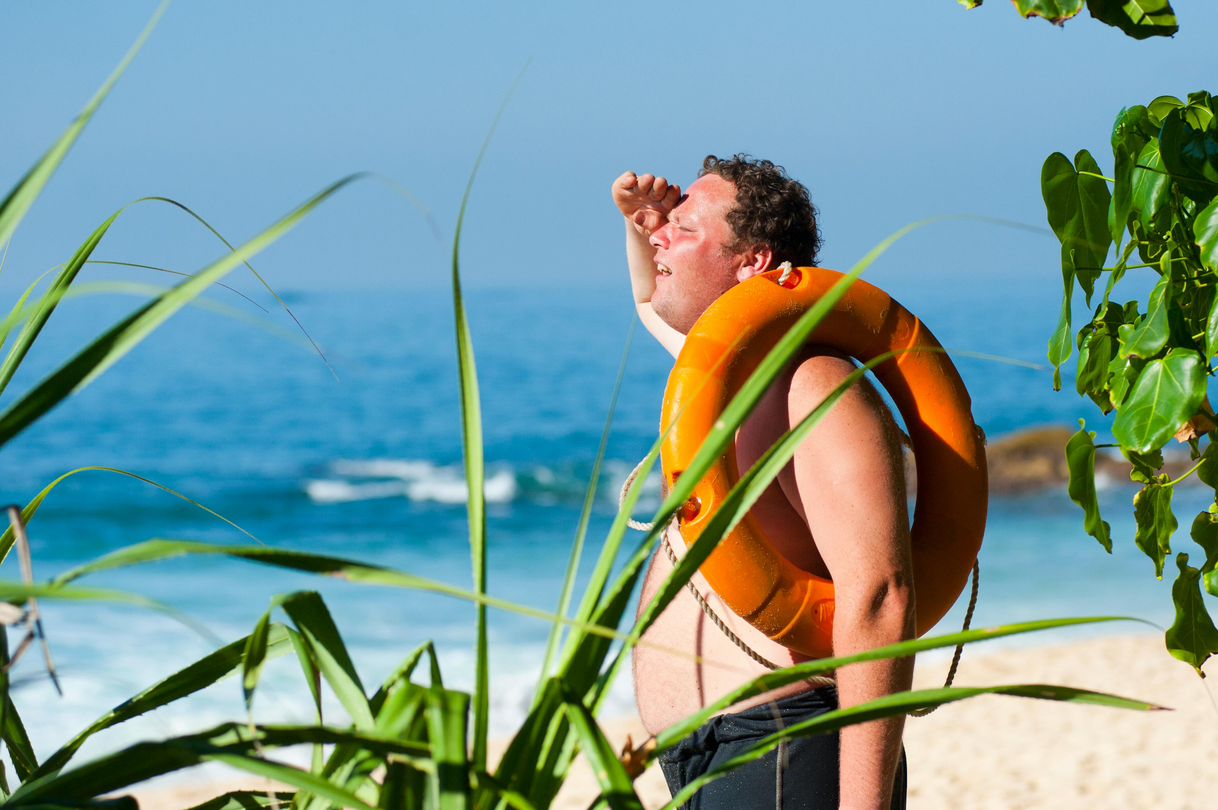 Man suffering from heatwave.