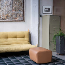 Load image into Gallery viewer, Phoenix carpet by New Weave with a geometric checkered pattern, made with ECONYL® regenerated nylon, placed under a yellow sofa and coffee table in a minimalist room.