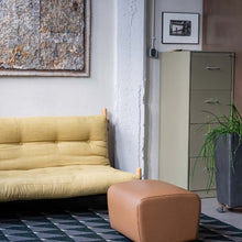 Load image into Gallery viewer, Phoenix carpet by New Weave with a geometric checkered pattern, made with ECONYL® regenerated nylon, placed under a yellow sofa and coffee table in a minimalist room.