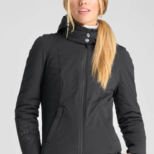 Charger l'image dans la galerie, Woman wearing a black ‘Deer Light Stretch Jacket’ by Hy Sport, made with ECONYL® regenerated nylon.