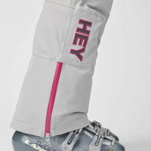 Load image into Gallery viewer, A pair of white ski pants by Hey Sport, made with ECONYL® regenerated nylon