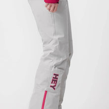 Load image into Gallery viewer, A pair of white ski pants by Hey Sport, made with ECONYL® regenerated nylon