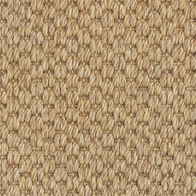 Close-up of beige SynSisal weave rug, made with ECONYL® regenerated nylon