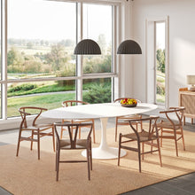 Charger l'image dans la galerie, Modern living room with a beige SynSisal weave rug, a white table in the center, a pendant light, ceiling-mounted speaker, and a window overlooking a green field.