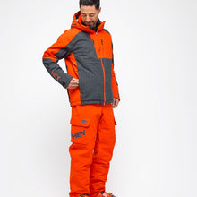 Load image into Gallery viewer, Man wearing the Alyeska-Ecoball Pants Hey Sport color Orange made with ECONYL® regenerated nylon