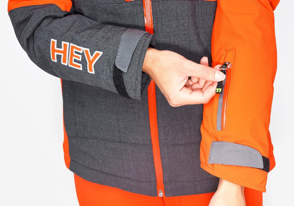Pocket detail of the Snowbird Wool Jacket Woman Hey Sport color Grey and Orange made with ECONYL® regenerated nylon