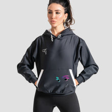 Load image into Gallery viewer, A woman modeling a black athletic pullover hoodie by the brand GoofyPRO with white drawstrings, made with ECONYL®nylon   

