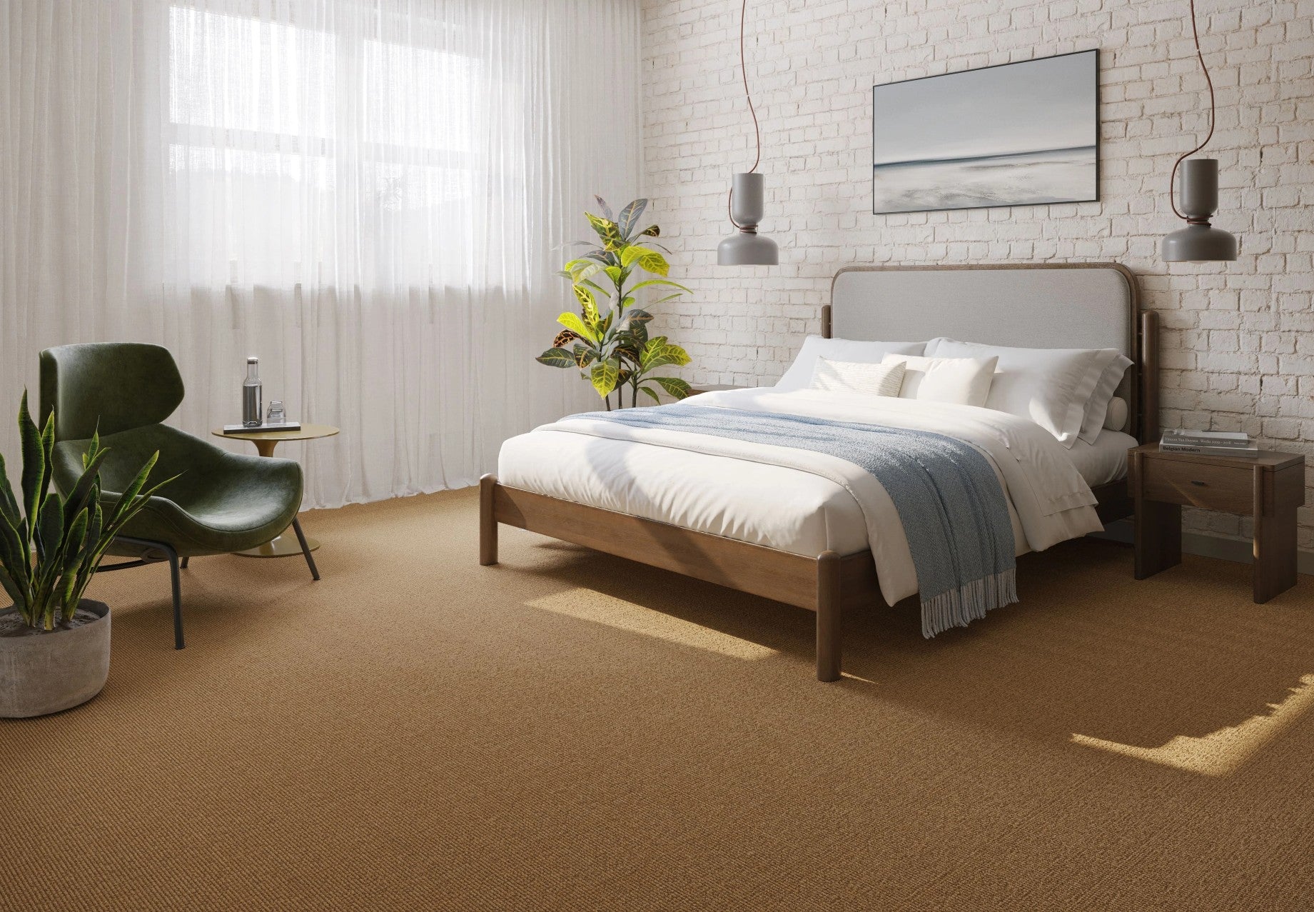 Modern bedroom with a bed, chairs, and decor elements. Rug by Synsisal made with ECONYL® regenerated nylon