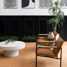 Charger l'image dans la galerie, Modern living room with brown chairs, white table, and abstract art on the wall. Rug by Synsisal made with ECONYL® regenerated nylon

