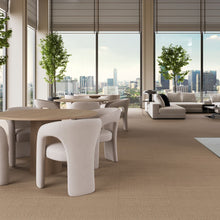 Charger l'image dans la galerie, Modern office interior with a large window view of a city skyline. Rug made with econyl nylon
