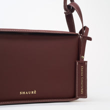 Charger l'image dans la galerie, Burgundyb handbag  made with ECONYL® regenerated nylon on a white background
