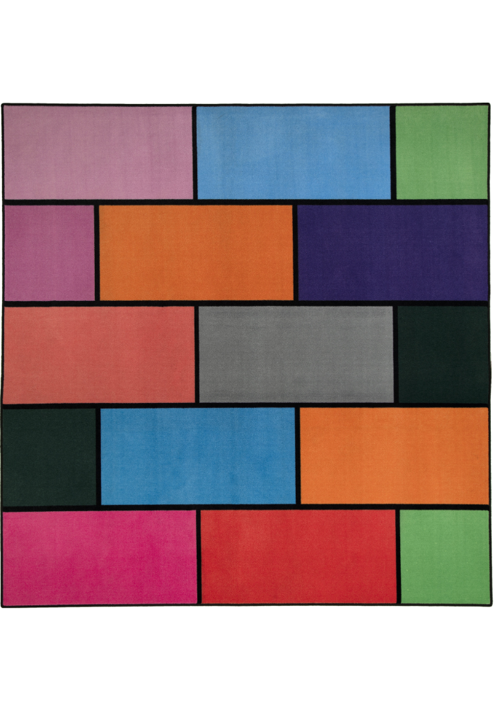 A colorful geometric carpet with bold blocks of color. Limited edition art piece by Ugo Rondinone, made with ECONYL® yarn.
