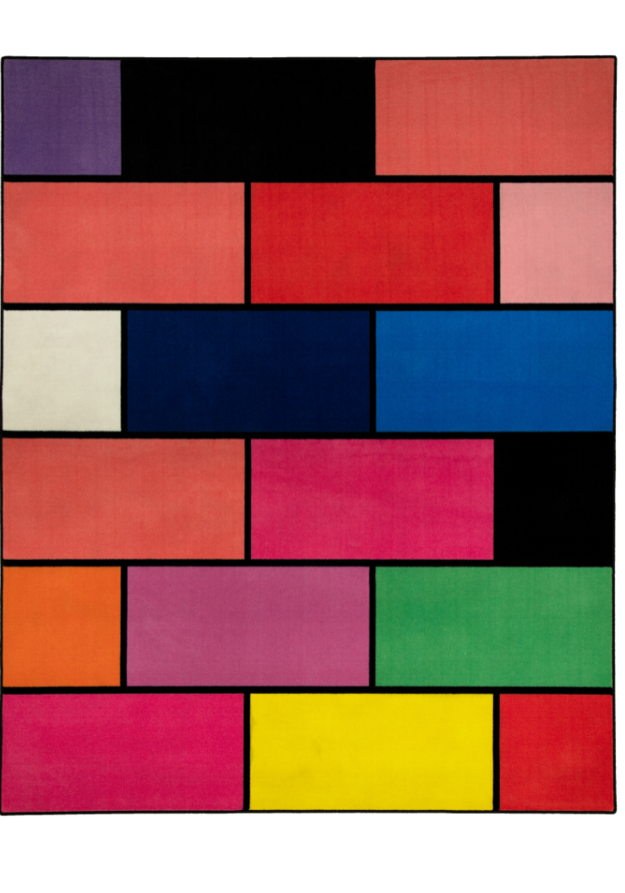 A colorful geometric carpet with bold blocks of color. Limited edition art piece by Ugo Rondinone, made with ECONYL® yarn.
