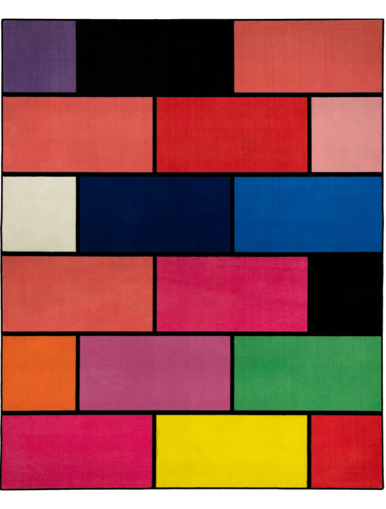 A colorful geometric carpet with bold blocks of color. Limited edition art piece by Ugo Rondinone, made with ECONYL® yarn.