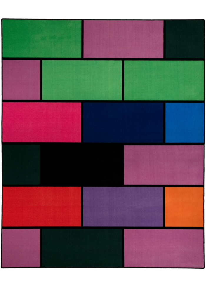 A colorful geometric carpet with bold blocks of color. Limited edition art piece by Ugo Rondinone, made with ECONYL® yarn.