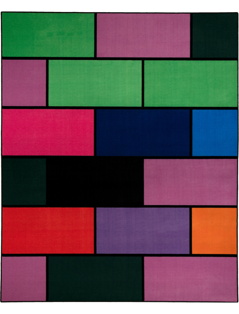 A colorful geometric carpet with bold blocks of color. Limited edition art piece by Ugo Rondinone, made with ECONYL® yarn.