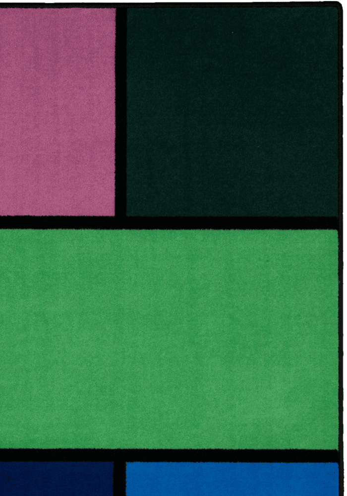 A colorful geometric carpet with bold blocks of color. Limited edition art piece by Ugo Rondinone, made with ECONYL® yarn.