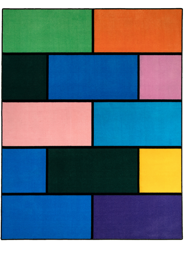 A colorful geometric carpet with bold blocks of color. Limited edition art piece by Ugo Rondinone, made with ECONYL® yarn.