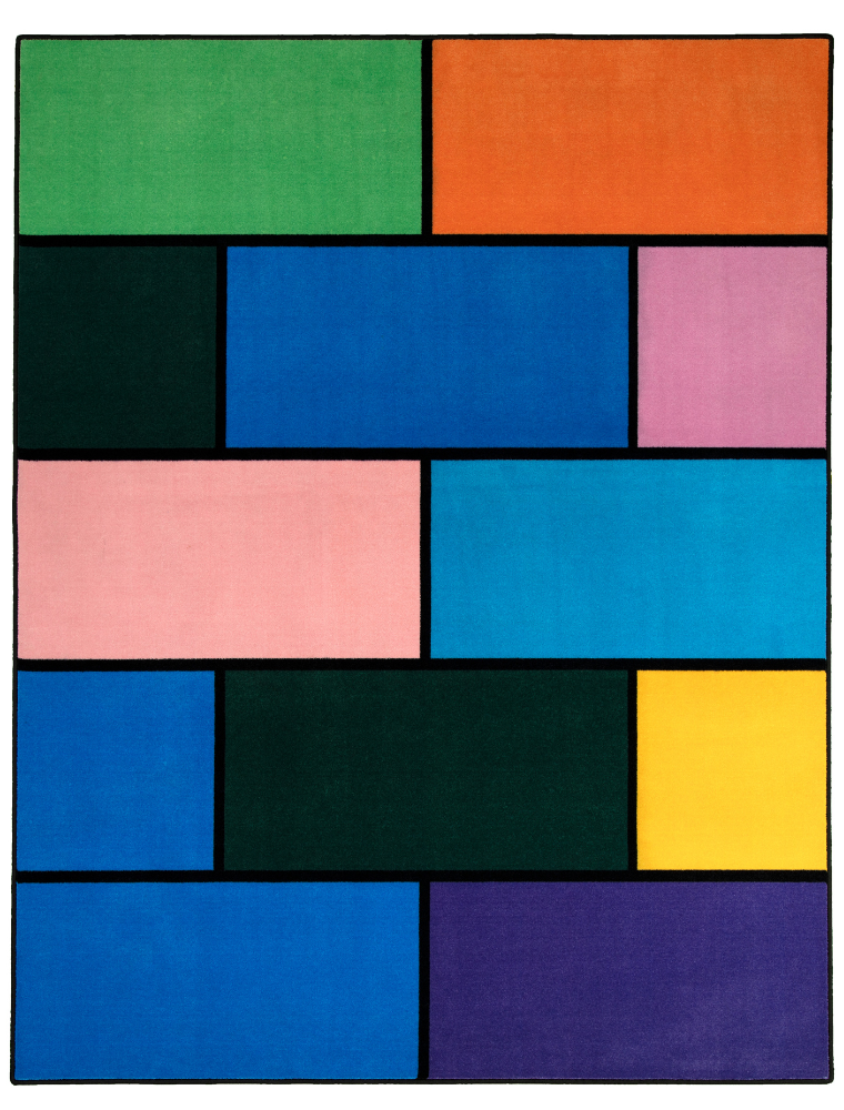 A colorful geometric carpet with bold blocks of color. Limited edition art piece by Ugo Rondinone, made with ECONYL® yarn.
