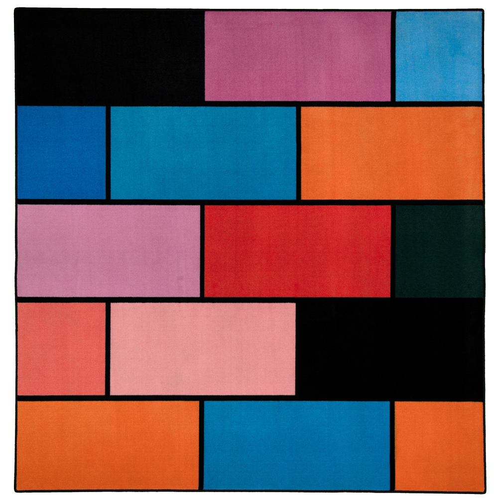 A colorful geometric carpet with bold blocks of color. Limited edition art piece by Ugo Rondinone, made with ECONYL® yarn.