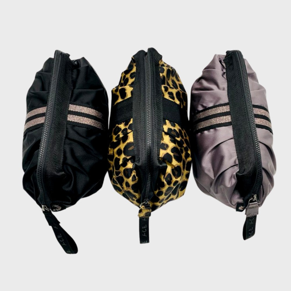 Three ACE Cosmetic Bag color Black Mauve Leopard made with ECONYL® regenerated nylon