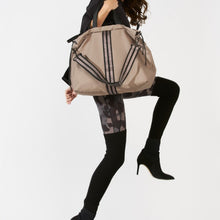 Load image into Gallery viewer, Woman carrying a ACE Tote Bag color Taupe made with ECONYL® regenerated nylon
