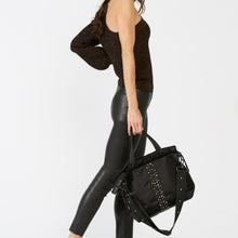 Load image into Gallery viewer, Woman carrying a ACE Urban Tote Bag color Black made with ECONYL® regenerated nylon
