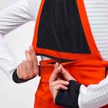 Charger l&#39;image dans la galerie, Zipper detail of the Crested Pants Hey Sport color Orange made with ECONYL® regenerated nylon
